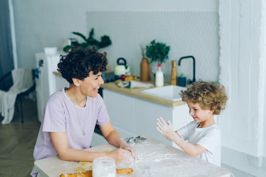 happy family cooking together in the kitchen