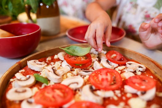 kids making pizza