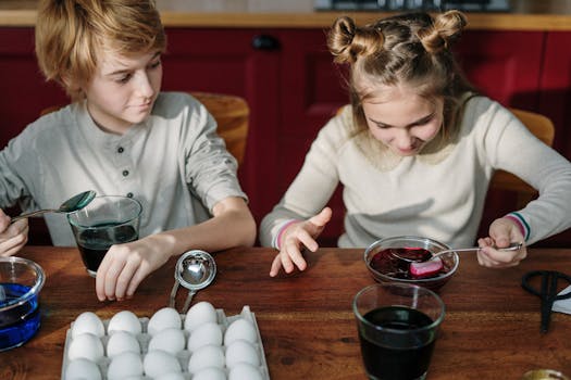 kids dipping veggies in colorful dips