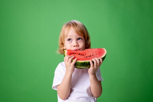 happy child eating healthy food