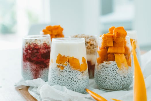 Colorful yogurt parfait with fruits and granola