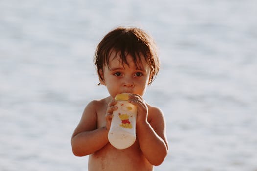 happy child drinking water