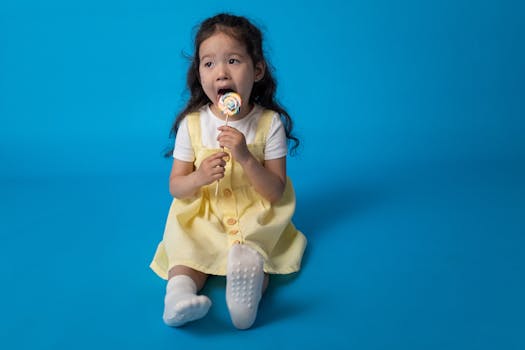 happy toddler enjoying a colorful meal