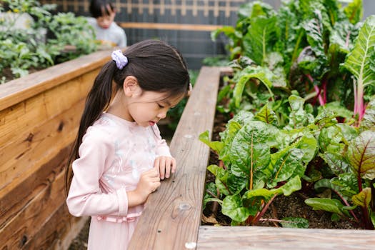 children exploring vegetables in a garden