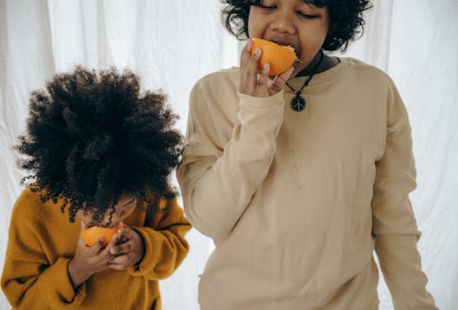 happy children enjoying fruits