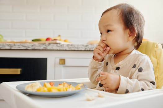 happy child eating fruit