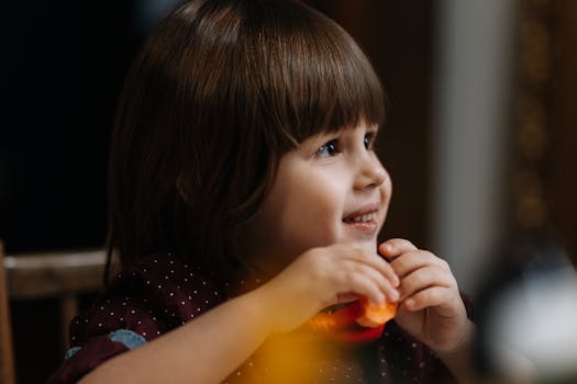 child focused on healthy meal