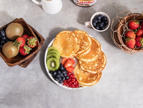 colorful breakfast spread with fruits and cereals